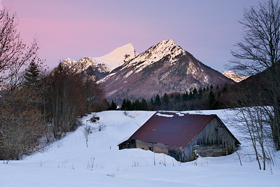 Mountain landscape at dusk time in winter in Massif des Bauges natural park