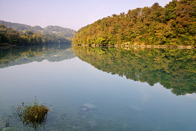 Photograph of an autumn river by an early autumn morning