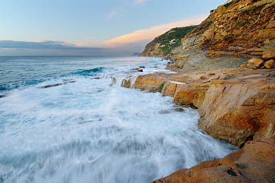 Mediterranean waves splashing on the rocks